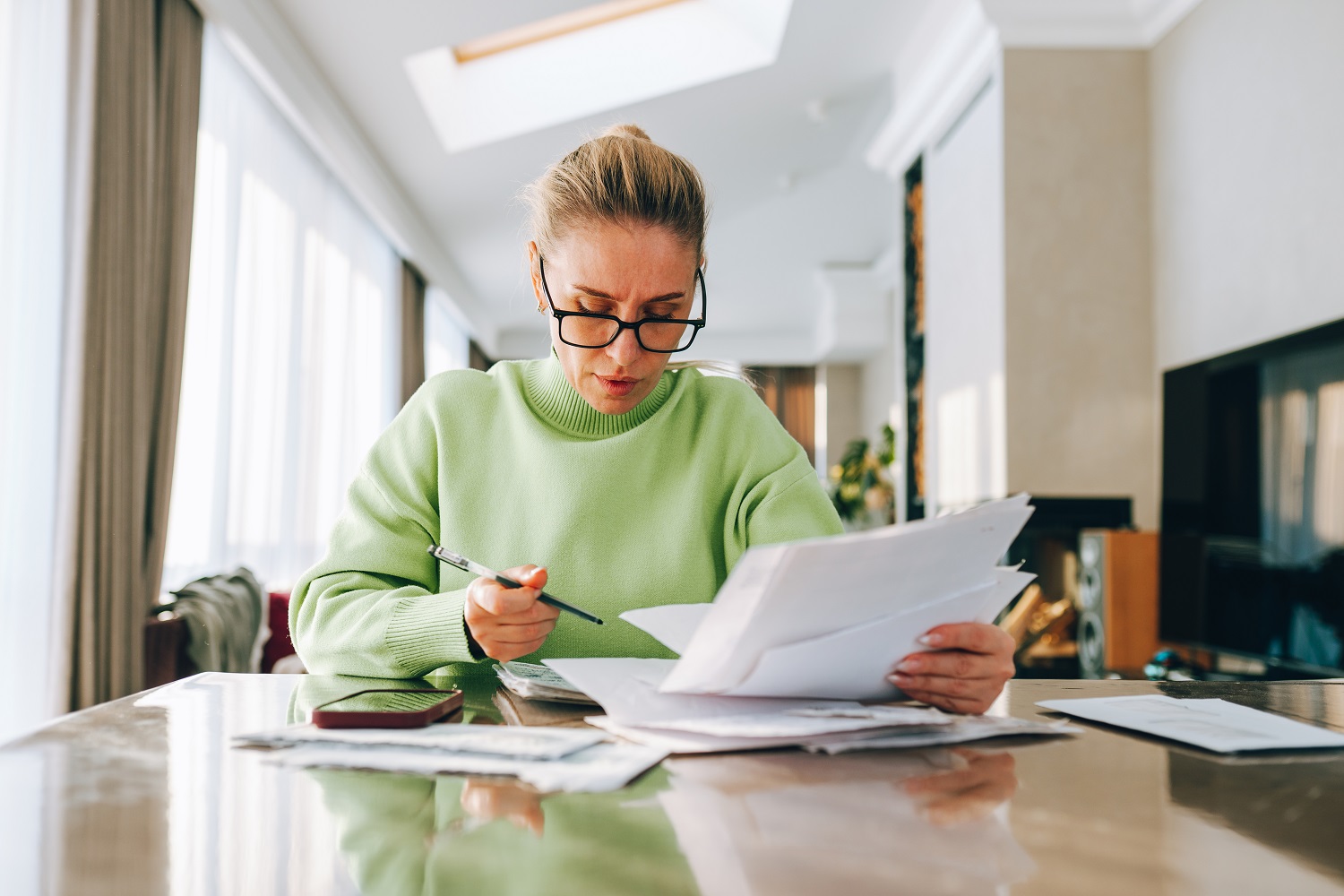 Mortgage professional reviewing client documentation